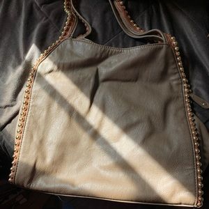 Stylish gold studded hobo bag